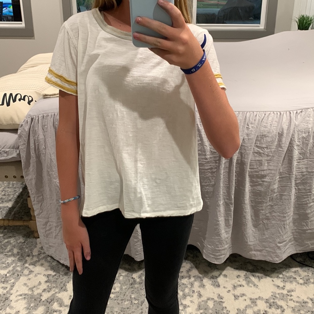 White hem and thread, size small shirt